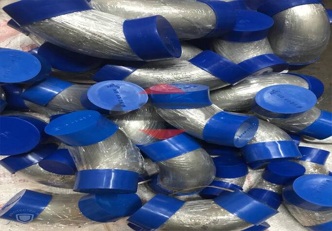 A Pile Of Stainless Steel Elbow